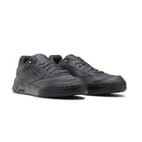 Championes Reebok Club C Legacy de hombre, color gris oscuro con detalles en rojo. Confeccionados en cuero y tela, con suela de goma negra.