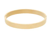 Esclava de acero con baño de oro y diseño de guarda griega.