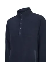 Buzo de polar color azul marino con cuello alto y cierre parcial de botones a presión en el frente. De manga larga y calce recto.