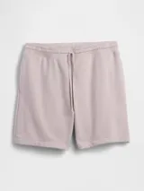 Short deportivo de hombre color negro, con cintura elástica ajustable mediante cordón y diseño holgado.