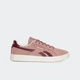 Championes Reebok Core Heritage Court de gamuza en color rosado, con detalles en bordó y suela blanca.