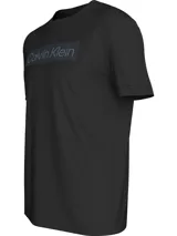 Remera negra de algodón con cuello redondo y mangas cortas. Estampado frontal con el logo de Calvin Klein en color gris.