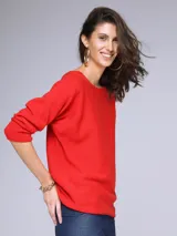 Sweater rojo de tejido de punto, corte holgado y mangas 3/4.