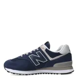 Championes urbanos New Balance modelo 574, color azul marino con detalles en gris y blanco, confeccionados en gamuza y malla, con logo "N" característico en los laterales y entresuela ENCAP.