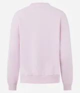 Buzo de algodón con felpa, color rosado, con cuello redondo, mangas largas y puños y bajo en rib. Presenta un estampado localizado en el pecho.