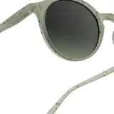 Lentes de sol Izipizi Sun #D, de forma redonda y color verde con motas negras.