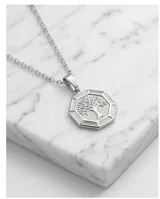 Dije de acero antialérgico con diseño circular octogonal que presenta un árbol de la vida grabado en relieve.