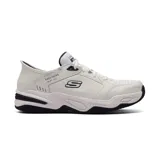 Championes deportivos Skechers modelo Slip-ins Relaxed Fit: Durham - Delvor, color blanco con detalles en azul marino. Presentan tecnología Hands Free Slip-ins con Heel Pillow, cordones y plantilla Air-Cooled Memory Foam.