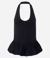 Blusa frente única de algodón color negro, con escote halter y ruedo estilo peplum con volados.