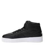 Championes de caña media Topper modelo Terre Mid, color negro con suela blanca. Presentan un diseño urbano con cordones y textura granulada en el material exterior.