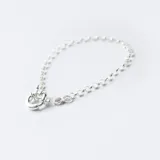 Pulsera de plata 925 con diseño de cadena rolo y cierre marinero.