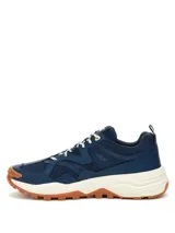 Championes Cat modelo Grapple, de diseño robusto en color azul con detalles en blanco y suela de goma color caramelo. Confeccionados en una combinación de cuero y malla textil, cuentan con cierre de cordones y entresuela de EVA para mayor amortiguación.