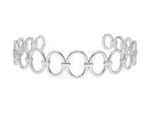 Esclava de acero abierta con diseño oval calado.