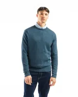 Buzo de punto color verde claro, con cuello redondo y mangas largas.