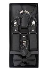 Set de tirantes negros con apliques de cuero y pinzas metálicas, moña negra y pañuelo de bolsillo negro con diseño de lunares blancos.