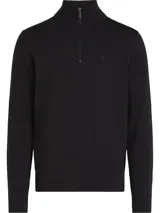 Buzo negro con textura tipo waffle, cuello alto con media cremallera, puños y dobladillo con punto canalé y mini monograma de Calvin Klein bordado.