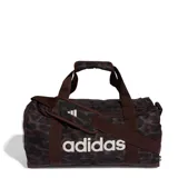 Bolso deportivo Adidas con diseño estampado animal print en tonos marrones y negros. Cuenta con correas de mano, correa de hombro ajustable con hombrera acolchada, cierre principal y logo de la marca estampado en el frente.
