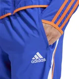 Pantalón deportivo azul con detalles en blanco y naranja, parte de la colección Adidas F50. Confeccionado en tejido técnico de punto doble, con logo de Adidas bordado.