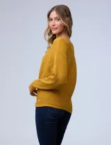 Buzo blanco en tejido acanalado, marca Ninety, con mangas largas japonesas.