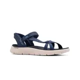 Sandalias deportivas Skechers Hands Free Slip-ins Go Walk Flex Illuminate, color azul marino, con tiras de malla jaspeada y correa ajustable en el empeine. Cuentan con tecnología Heel Pillow, plantilla anatómica Goga Mat y amortiguación Ultra Go.