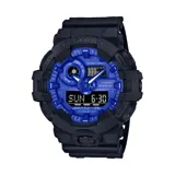 Reloj digital Casio G-Shock con correa de resina negra y esfera azul con detalles estampados. Resistente a golpes y al agua (200 metros).