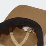 Gorra azul de algodón con logo de la marca bordado en verde en el frente.