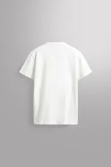 Camiseta de corte relajado confeccionada en tejido de algodón compacto, con cuello redondo y manga corta, perteneciente a la línea Zara Athleticz.