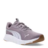 Championes Puma modelo Flex Focus Lite Modern, color negro con detalles en tono cobre. Presentan una suela blanca de espuma Pumalite ultraligera, parte superior de malla transpirable y plantilla SoftFoam+ para mayor amortiguación.