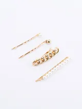 Set de cuatro hebillas para el pelo en color dorado, que incluye dos horquillas simples con detalle de perla y esfera metálica, una hebilla tipo clip con diseño de cadena y una horquilla larga decorada con una hilera de perlas.