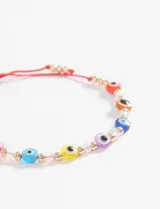 Pulsera elástica con cuentas de colores con diseño de ojo turco, cuentas doradas y pequeñas cuentas de cristal.