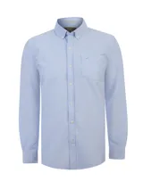 Camisa oxford de manga larga color celeste de la marca RKF, confeccionada en algodón orgánico. Presenta cuello americano con botones, cierre frontal con botones, bolsillo en el pecho con detalle de bordado al tono y calce regular.