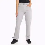 Pantalón de trekking desmontable color gris claro, con cintura elástica, cinturón interno ajustable, bolsillos con cierre y elástico interior en los tobillos.