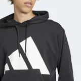 Buzo con capucha Adidas de corte holgado, color negro con el logo de la marca estampado en blanco en el frente. Cuenta con bolsillo tipo canguro, capucha con cordón ajustable y puños acanalados.