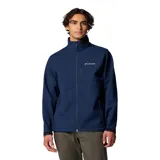Chaqueta Columbia modelo Ascender Soft Shell, color azul marino, con cuello alto, cierre frontal completo, bolsillo en el pecho y bolsillos laterales con cierre. Presenta puños ajustables y logo de la marca bordado en el pecho.