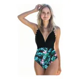 Malla enteriza con diseño combinado, parte superior en color verde petróleo con borde festoneado y parte inferior con estampado floral sobre fondo negro.