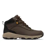 Bota de senderismo Columbia modelo Newton Ridge, confeccionada en cuero impermeable color marrón con detalles en negro y suela de goma beige. Presenta sistema de cordones con herrajes metálicos y tecnología de amortiguación para mayor estabilidad y tracción en terrenos variables.