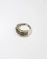 Anillo de plata 925 con dublé de oro y zirconias azules.