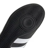 Championes Adidas modelo Tekwen, diseño sin cordones en color negro con las icónicas tres tiras blancas laterales y logo de la marca en el empeine y talón.