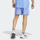 Short de running Adidas Own The Run, color azul claro, confeccionado en poliéster reciclado con tecnología AEROREADY. Presenta tres franjas blancas verticales en el lateral derecho y el logo de Adidas en la parte inferior izquierda.