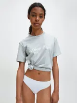 Colaless blanco de microfibra suave con bordes cortados a láser y logo de Calvin Klein estampado en la cadera.