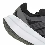 Championes Adidas Adirok de mujer, con diseño deportivo en color negro y mediasuela blanca con tecnología Cloudfoam. Presentan una estructura de malla transpirable con refuerzos sintéticos y cierre mediante cordones.