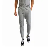 Pantalón de jogging gris con cintura elástica ajustable con cordón y logo de la marca bordado en la pierna izquierda.