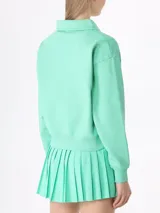 Buzo polo deportivo Prince bordado en menta con logo en blanco. Fabricado con 100% algodón, preencogido y de calce holgado con largo corto.