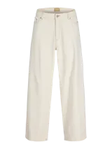 Jeans baggy de tiro bajo en color marfil, con diseño de pernera ancha y costuras pespunteadas a contratono.
