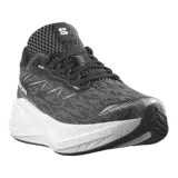 Championes de running Salomon Aero Glide 4, color negro con suela blanca alta y amortiguada. Presenta capellada de malla transpirable sin costuras y el nombre de la marca impreso en el lateral.