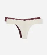 Kit de dos bombachas tipo bikini hilo de la marca Lov, confeccionadas en algodón con cintura baja y detalles de encaje contrastante en la cintura.
