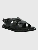 Sandalias negras de cuero con tiras cruzadas y detalles de tachas.