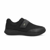 Champion deportivo Usaflex modelo Luna, color negro, con cierre de velcro y detalle de logo metálico dorado. Diseño ergonómico con suela plana y puntera reforzada.