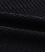 Remera color arena de corte regular, cuello redondo y manga corta. Tejido con textura vertical.