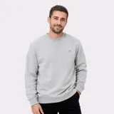 Buzo deportivo de cuello redondo, manga larga con puños elásticos y ruedo acanalado. Presenta un pequeño logo bordado en el pecho.
